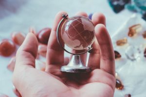 glass globe in hand
